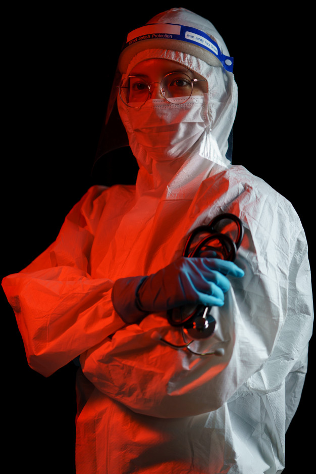 women doctor wearing protective suit corona virus covid 19 protection hazmat suit face shield gloves mask stethoscope 46370 1850