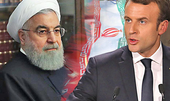 الرئيس الفرنسي إيمانويل ماكرون ونظيره الإيراني حسن روحاني